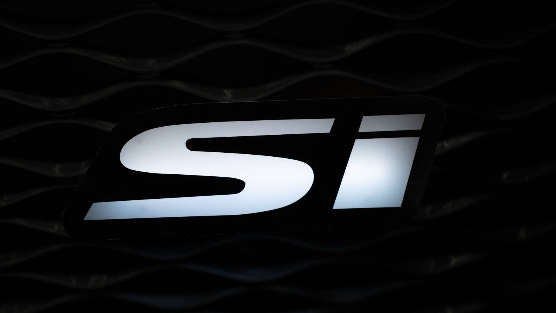 Flow Series Si LED Badge
