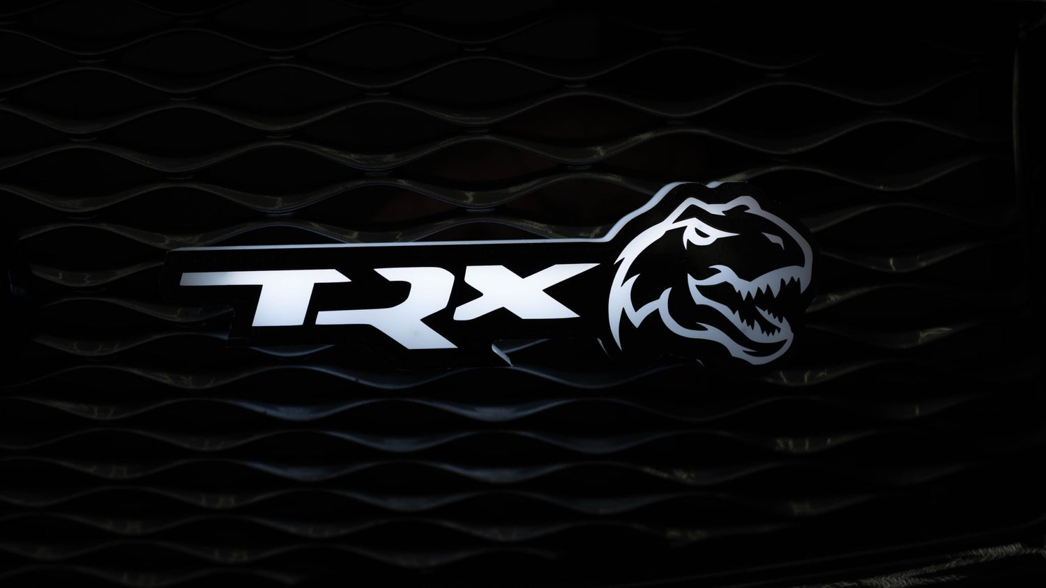 Flow Series TRX Dinosaur LED Badge
