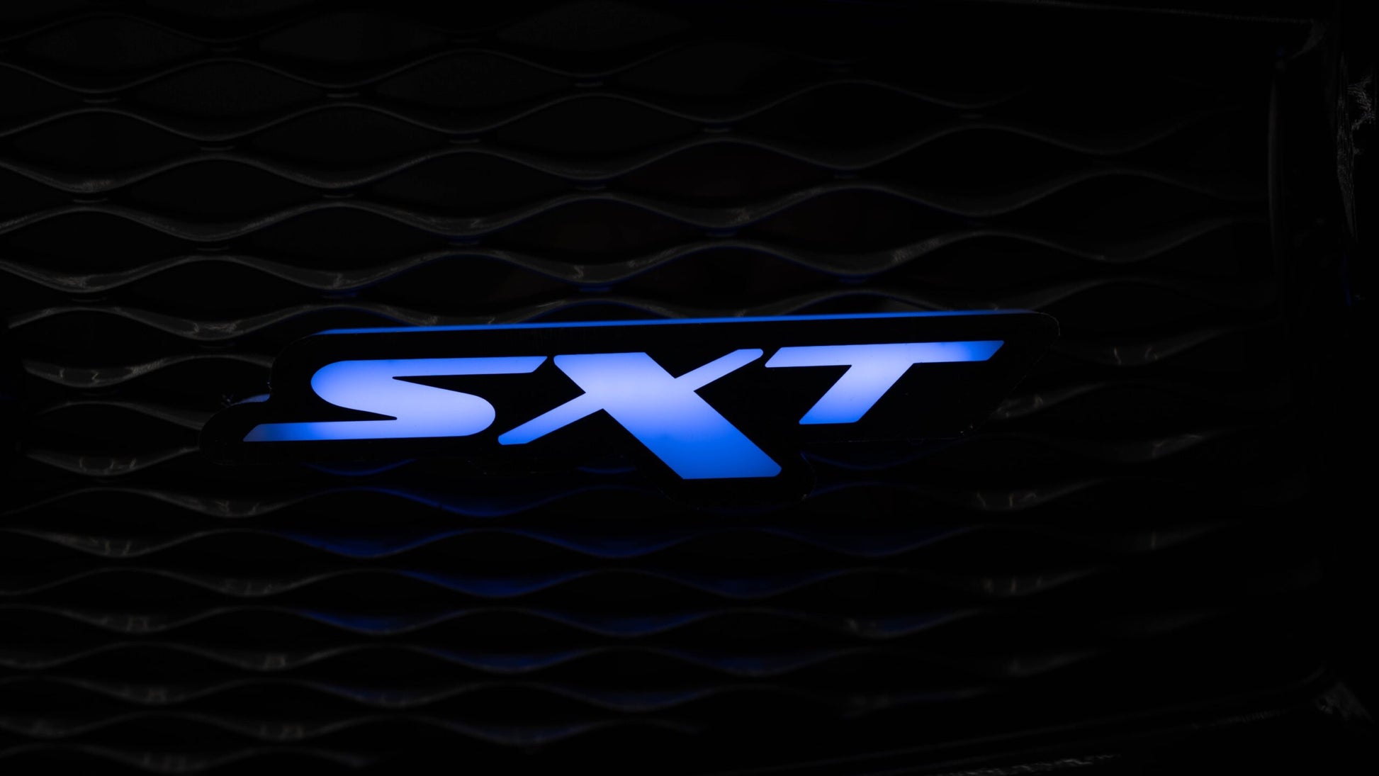 Flow Series SXT LED Badge