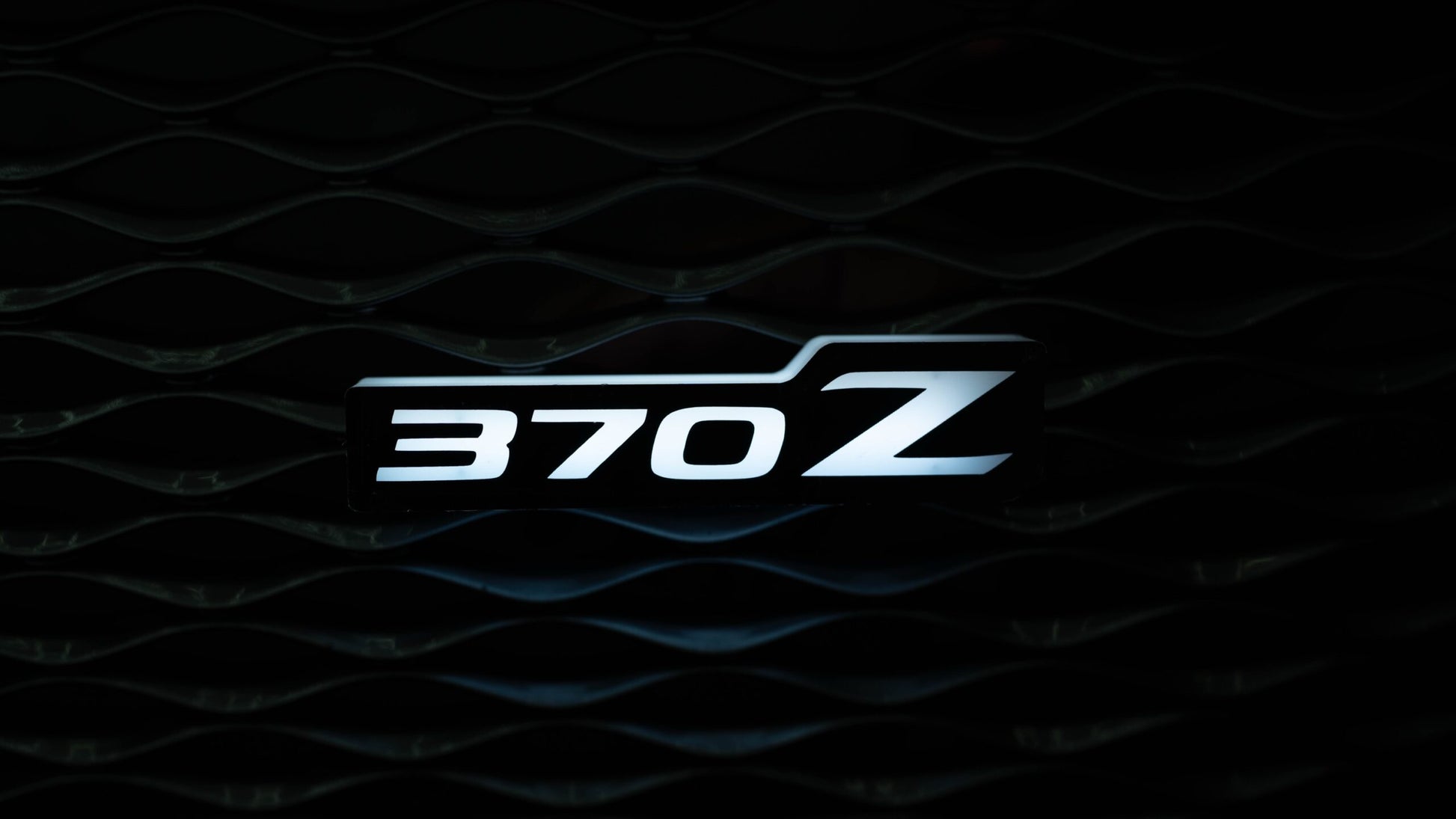 Flow Series 370Z LED Badge